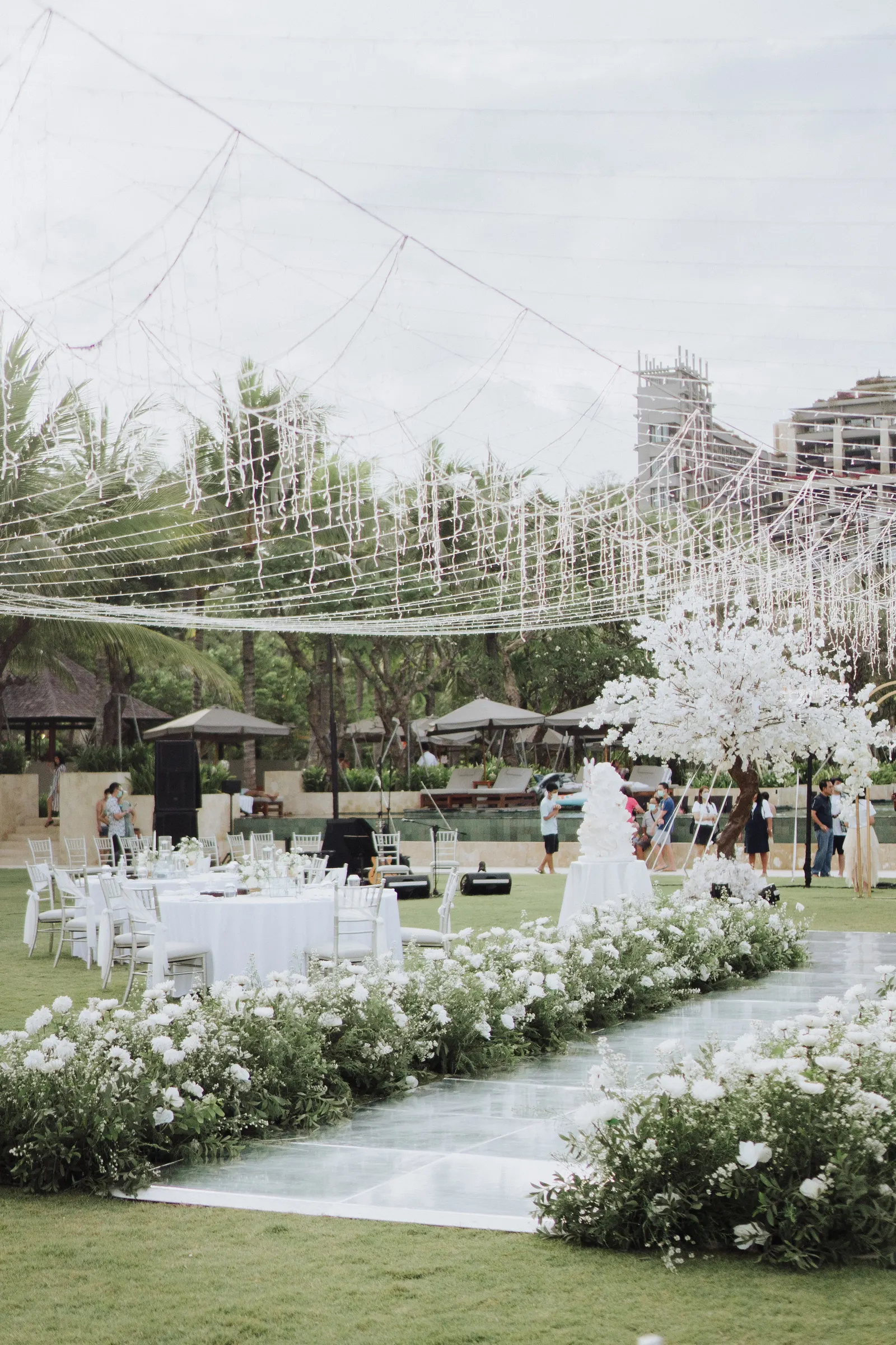 Mirror dance floor from across the lawn with the resort behind
