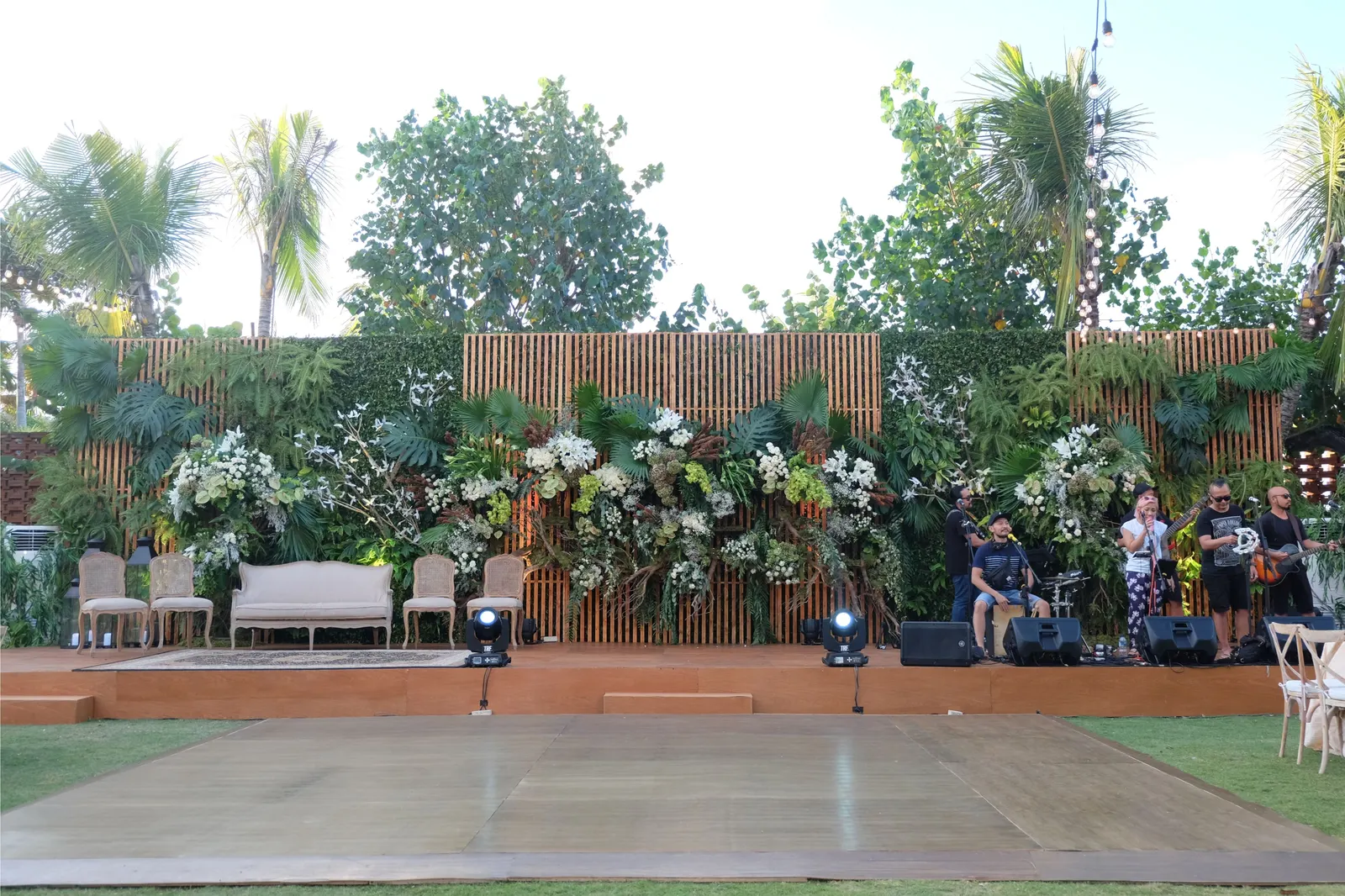 Timber dance floor laid flush with the lawn in front of the stage