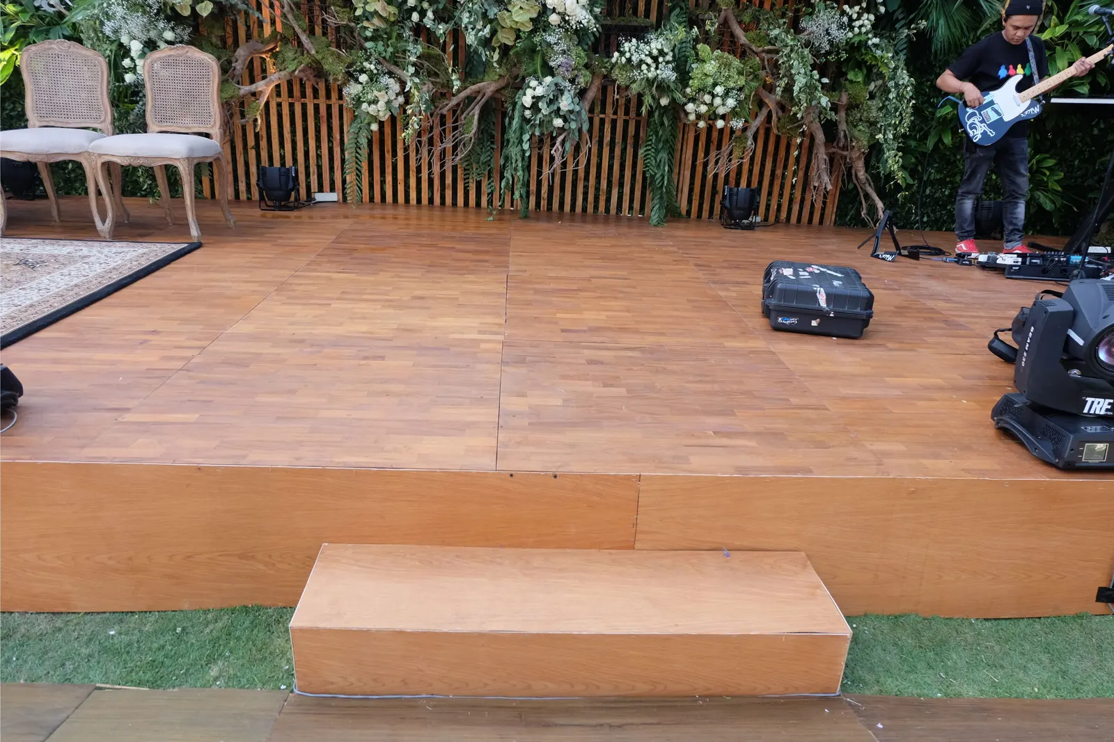 Performer on the timber stage during the reception